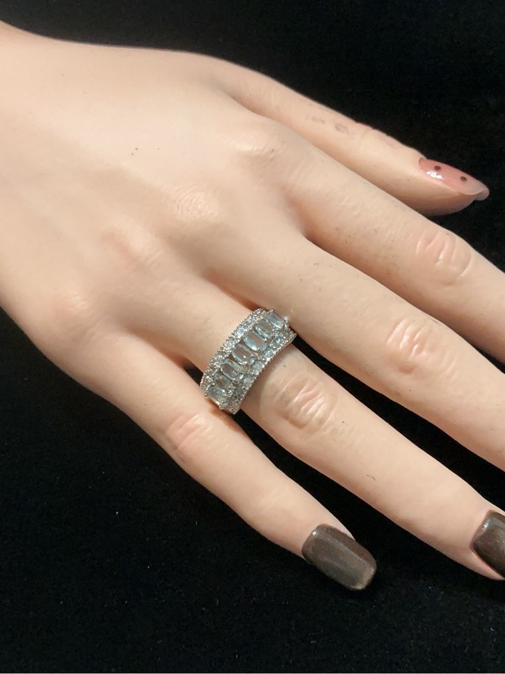 Adjust. Aquamarine ring